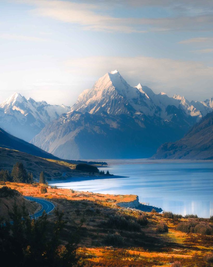 First-time visitor enjoying the view across Lake Pukaki towards Aoraki / Mount Cook.