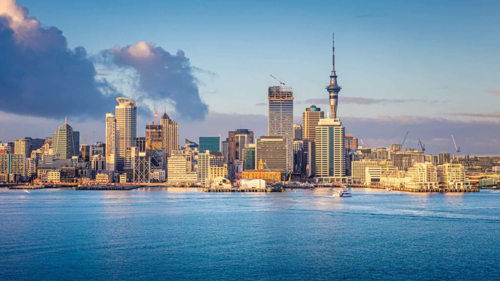 Visitors exploring a New Zealand city during their first trip.